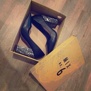 Black and white marble pumps